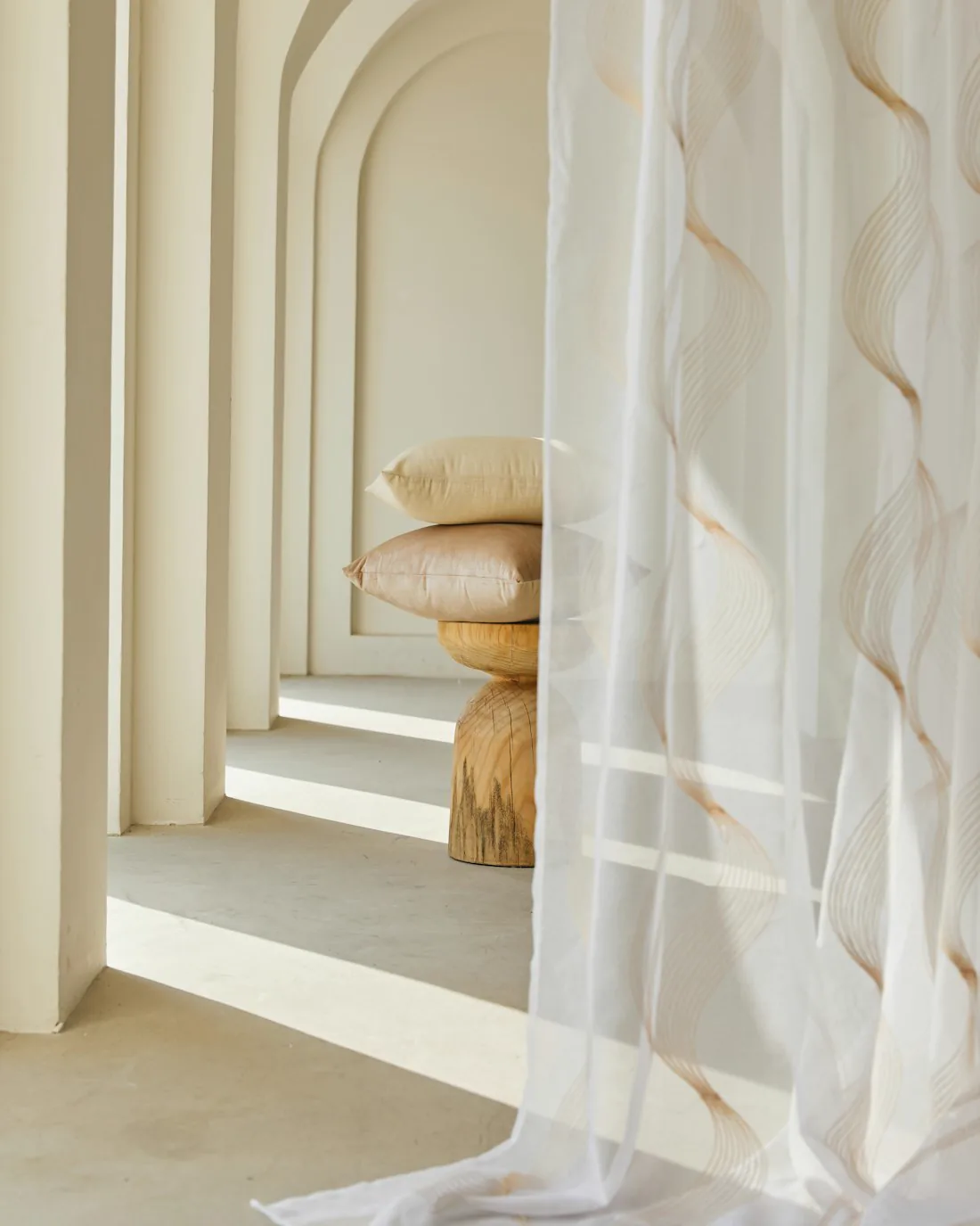 Folded linen laid out in the workshop
