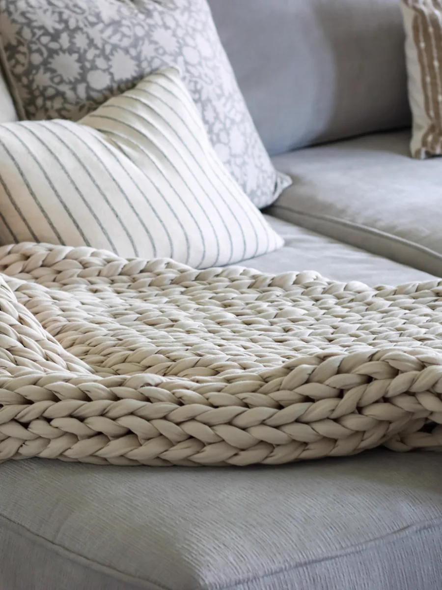 Alpaca throw laid over a bed